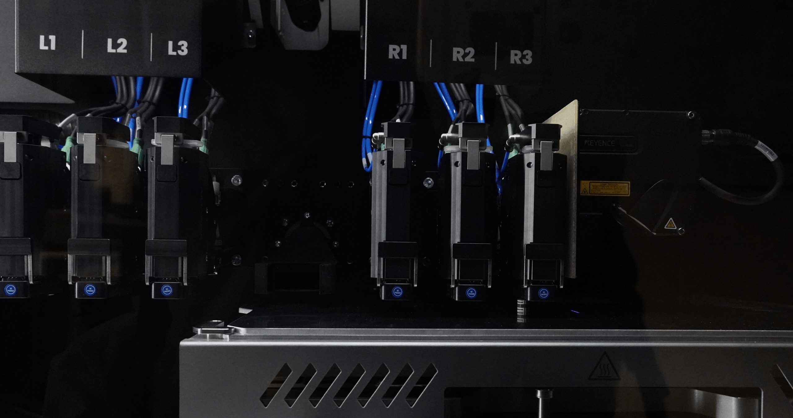 Multi-material part being printed inside the build chamber.